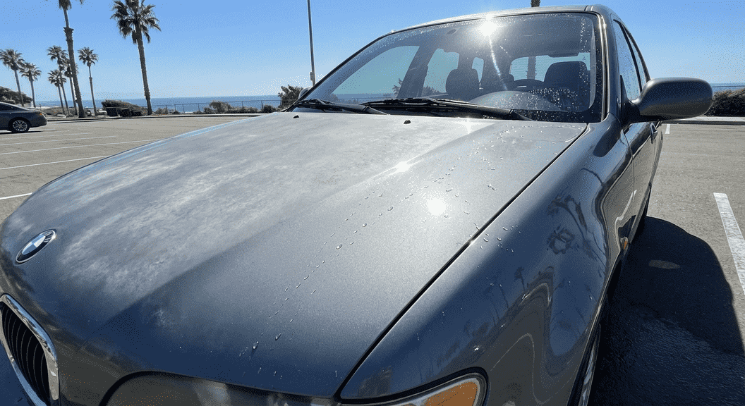 Ceramic coating protecting car paint from sun damage and fading in San Diego